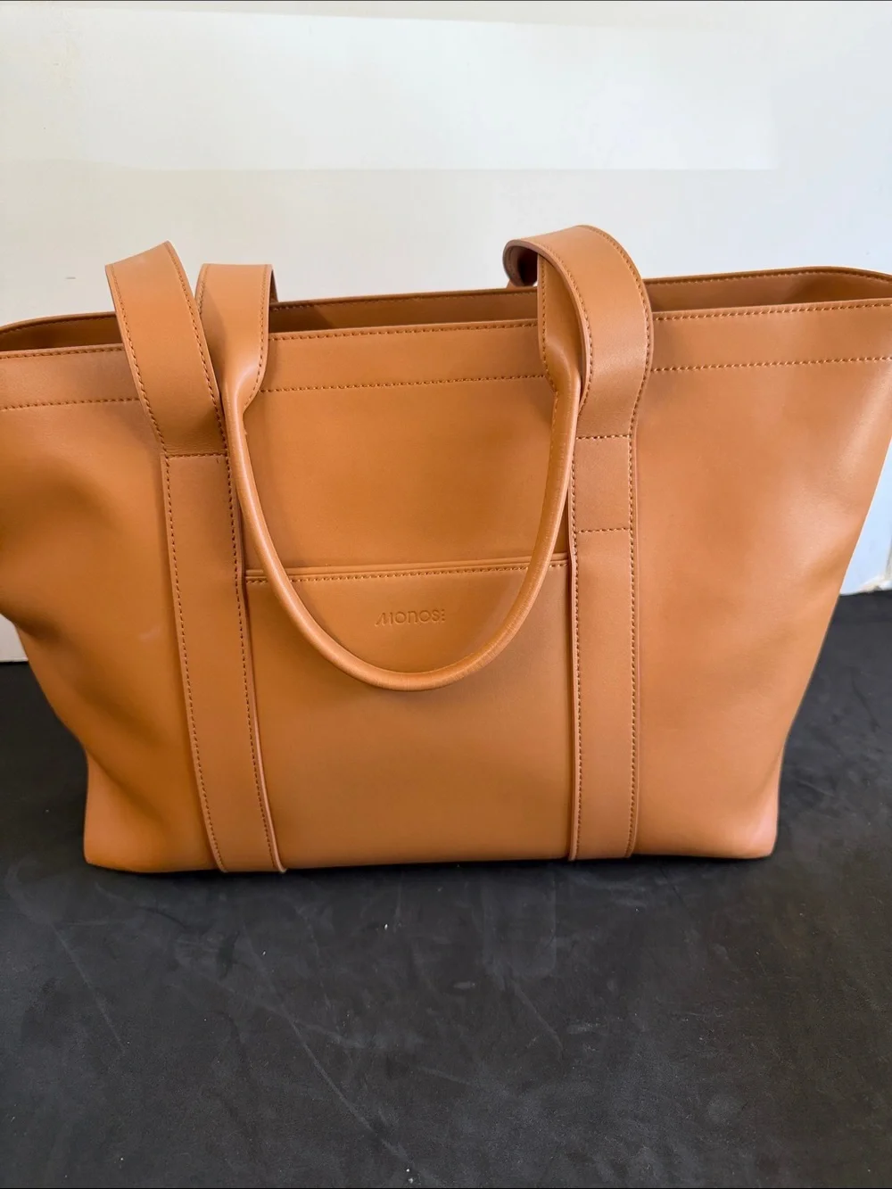 Monos tan leather